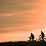 cyclist, person, people, men, nature, bicycle, cycling, exercise, active, travel, transport, ride, bicycle ride, road, sunset, silhouette